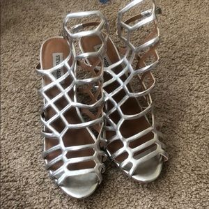 Three inch silver heels by Steve Madden, worn once
